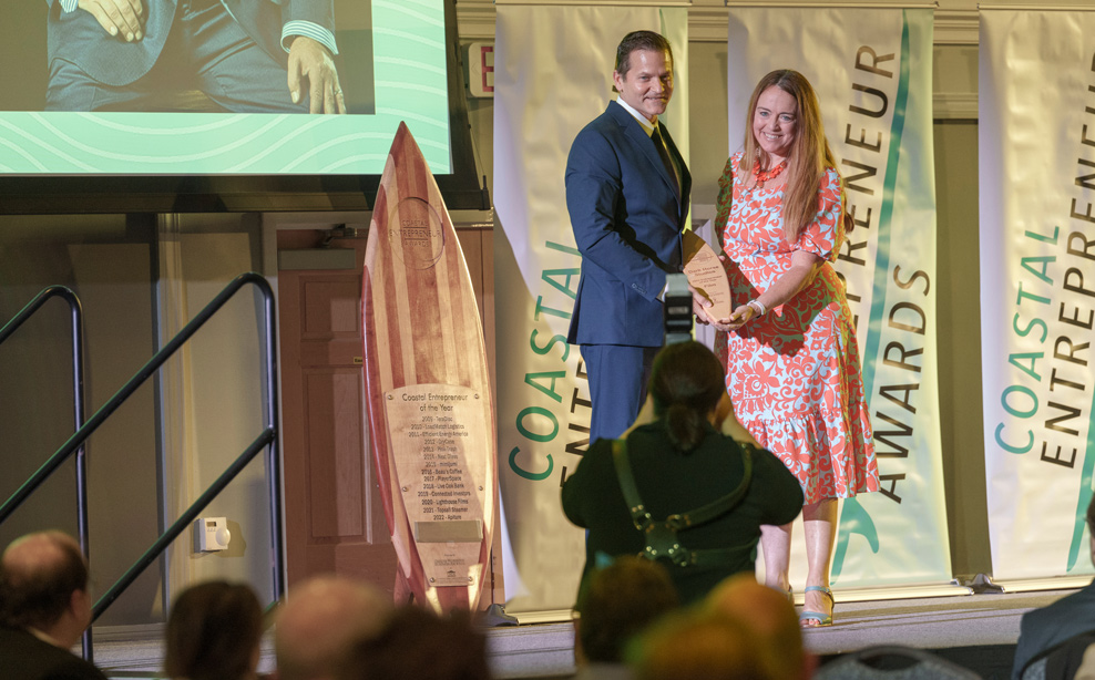 People that are posing at the coastal entrepreneur awards.