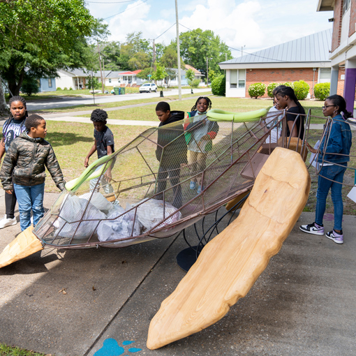 UNCW students gather in a field