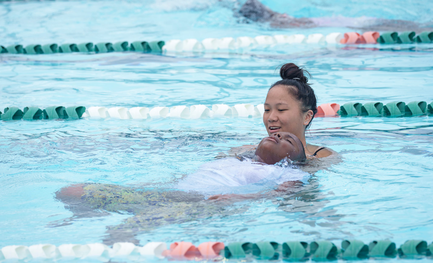 Youth practicing back-floating