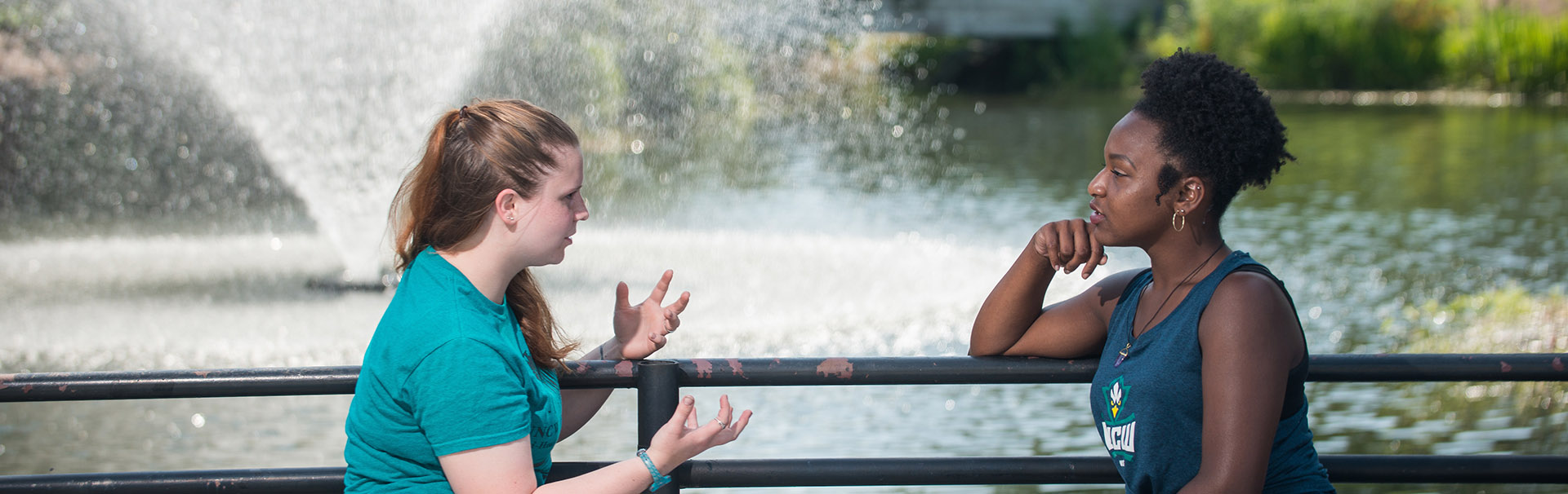 Students Talking by Water