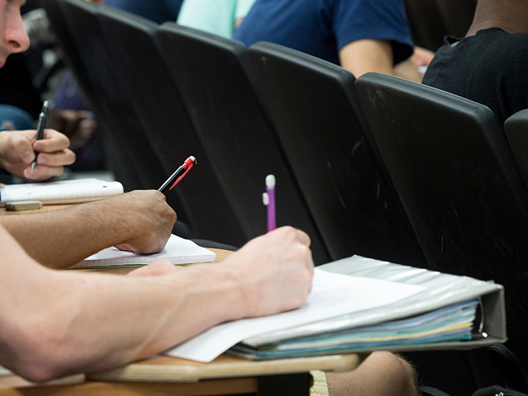 Students taking notes