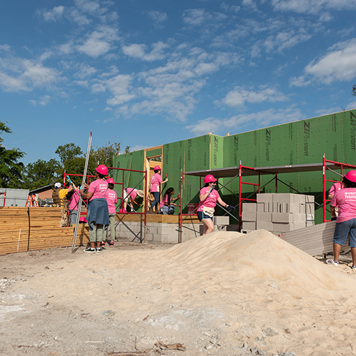 Volunteers helping to build homes