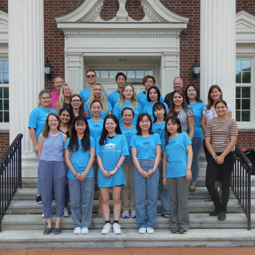 Group in front of building posing