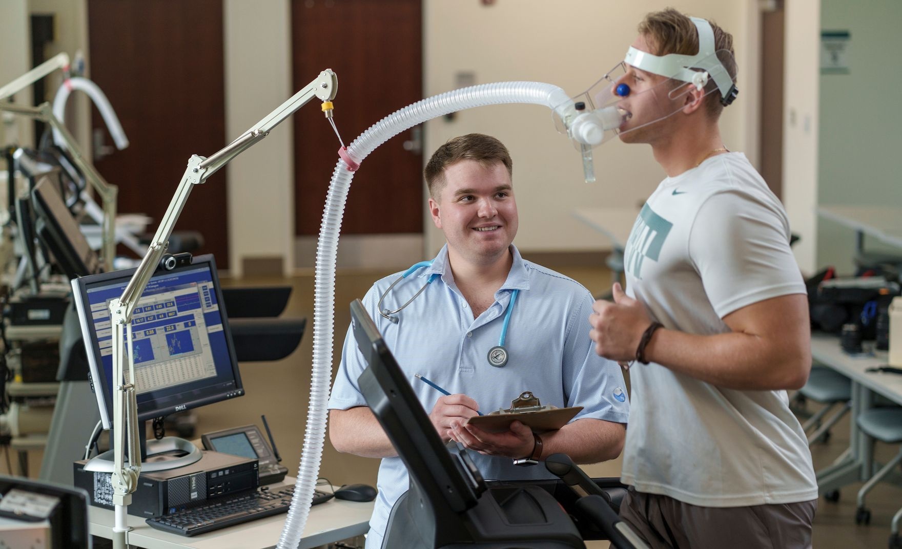 Man running on a treadmill testing oxygen levels