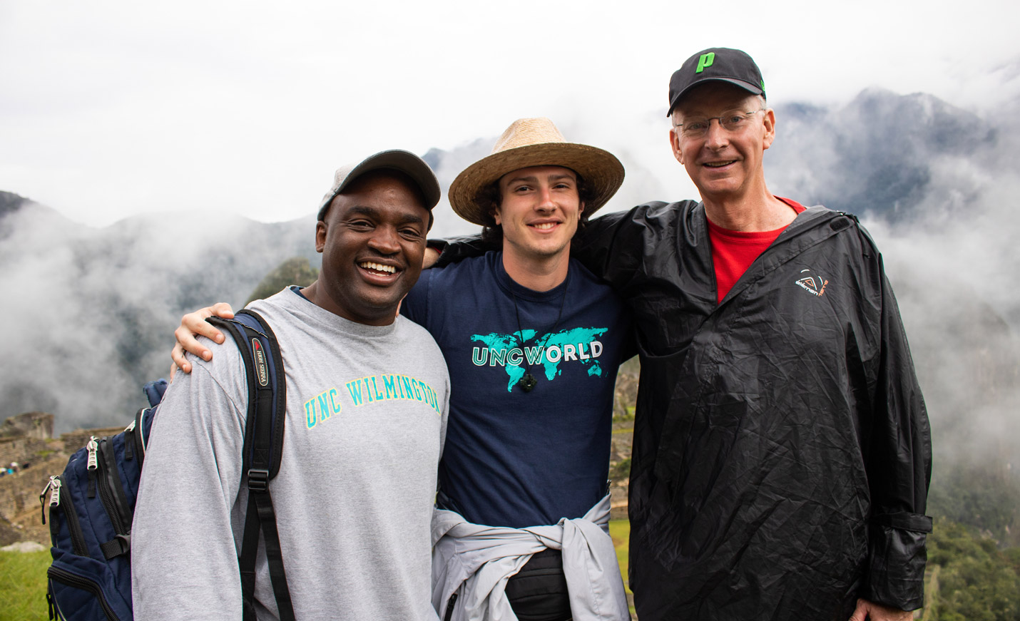 Professor with students in Peru