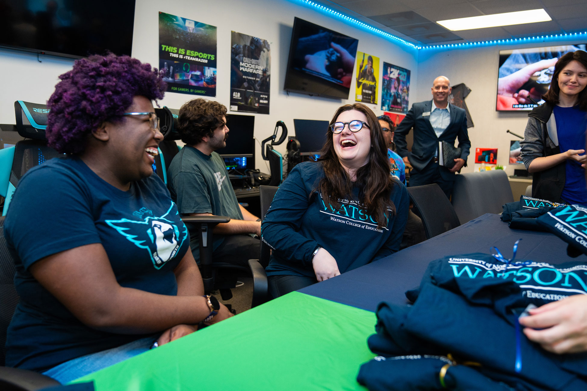 Student members of the UNCW Esports Club and competitive teams celebrate at the grand opening of the UNCW Esports Lab on October 10, 2023.  