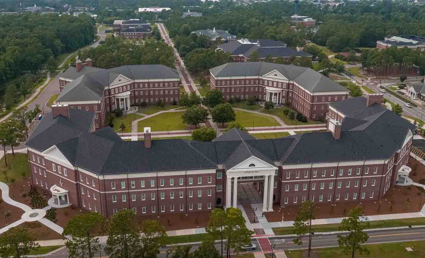 Veterans Hall, McNeill Hall and the Psychology lab building form the Health and Human Services Quad at the end of chancellor's walk.