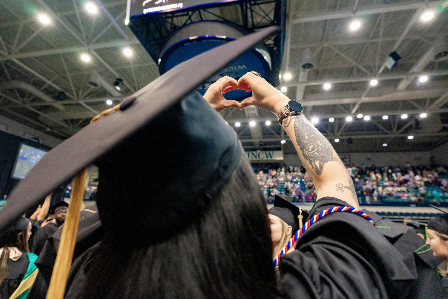 Graduate celebrating commencement