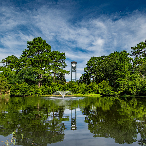 Clock tower and lake