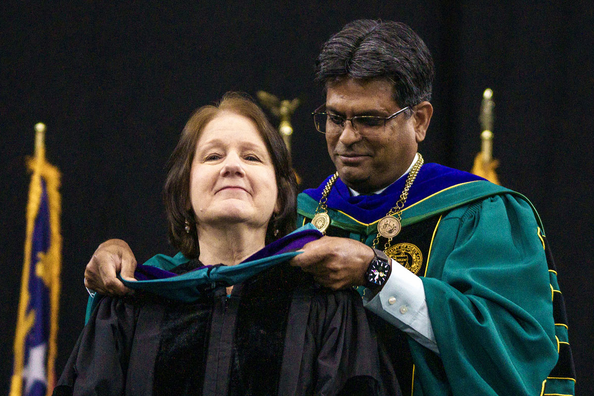 Linda Sayed and Chancellor Volety on stage at commencement