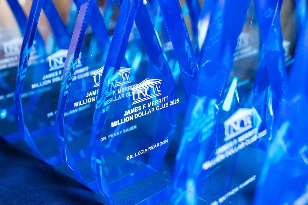 Glass awards given to new members of the James F. Merritt Million Dollar CLub