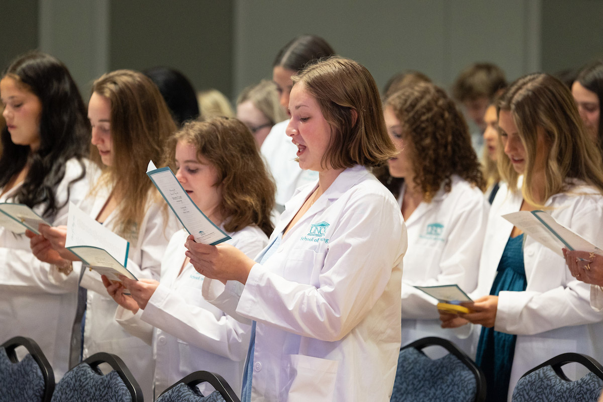 Nursing students recite from their program at the White Coat Ceremony