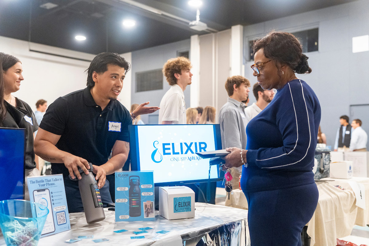 Students display their products to community members