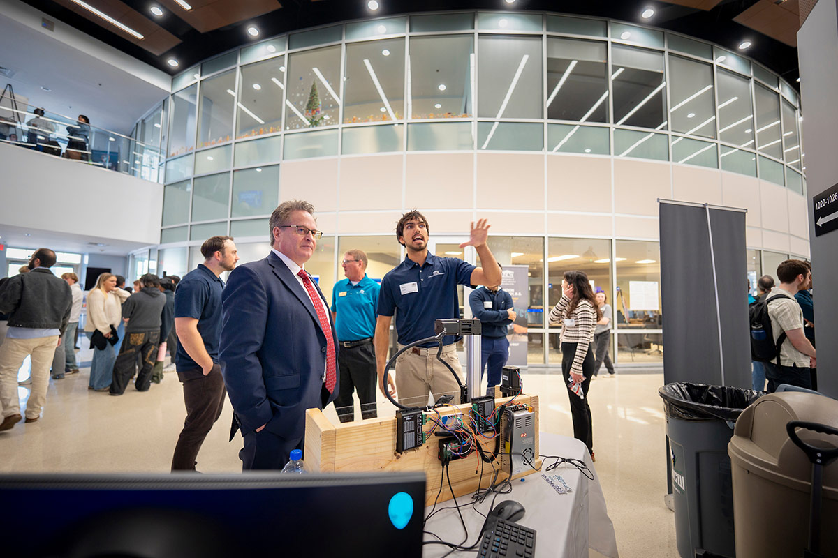 Ron Vetter among those browsing the Computing Showcase