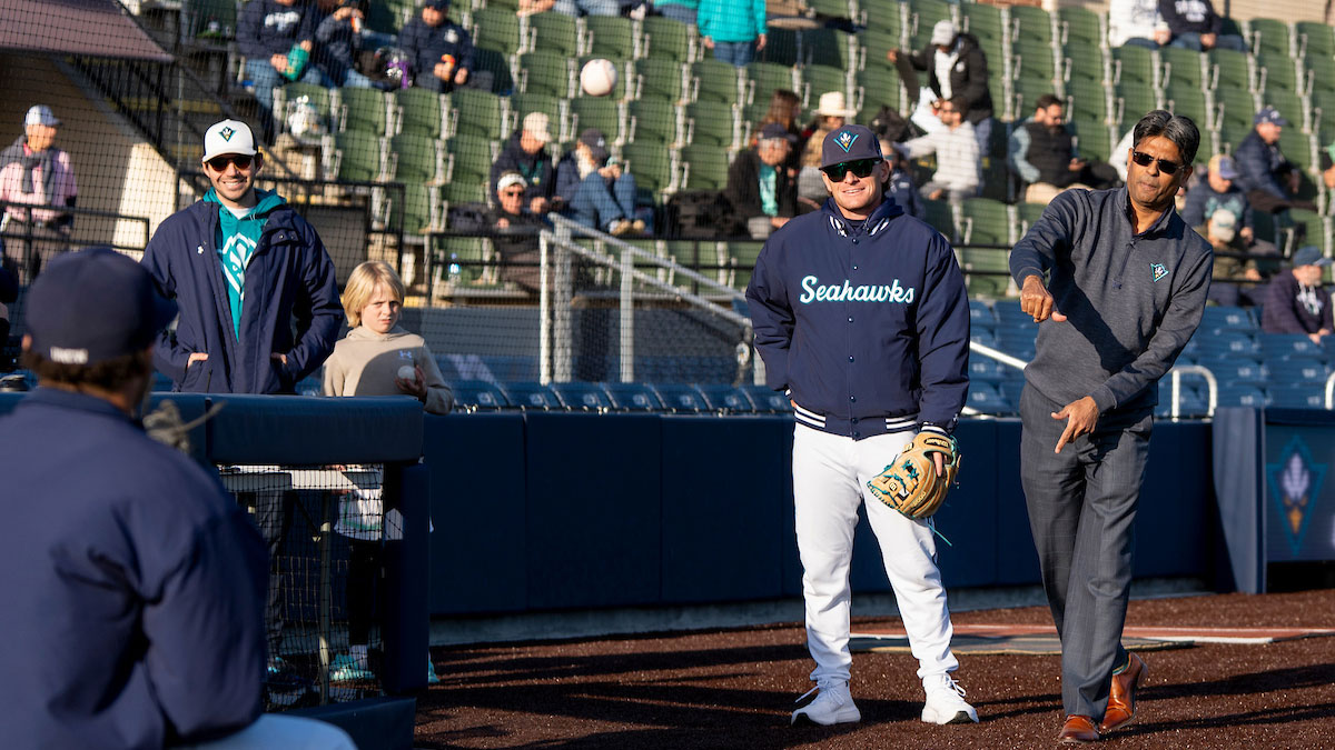 Chancellor Votlety trows a baseball near the stands on Brooks Field