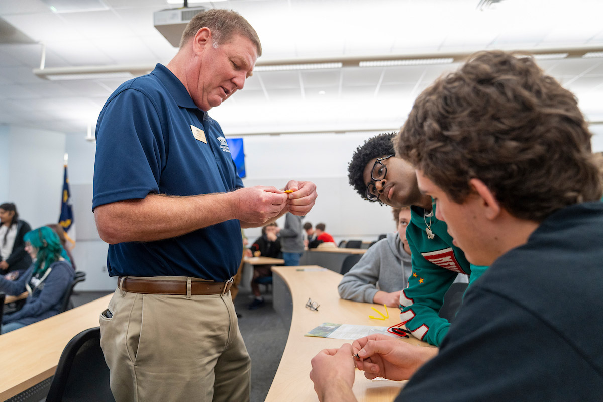 Students watch and create their own "bristle bots" 