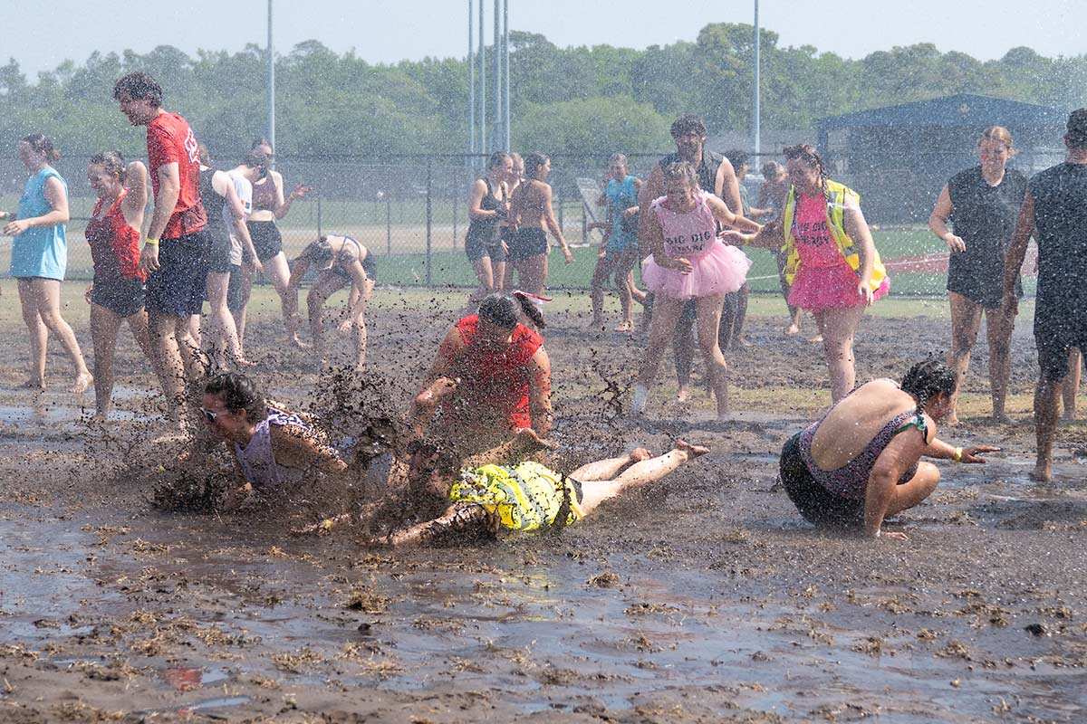 Oozeball players in the mud