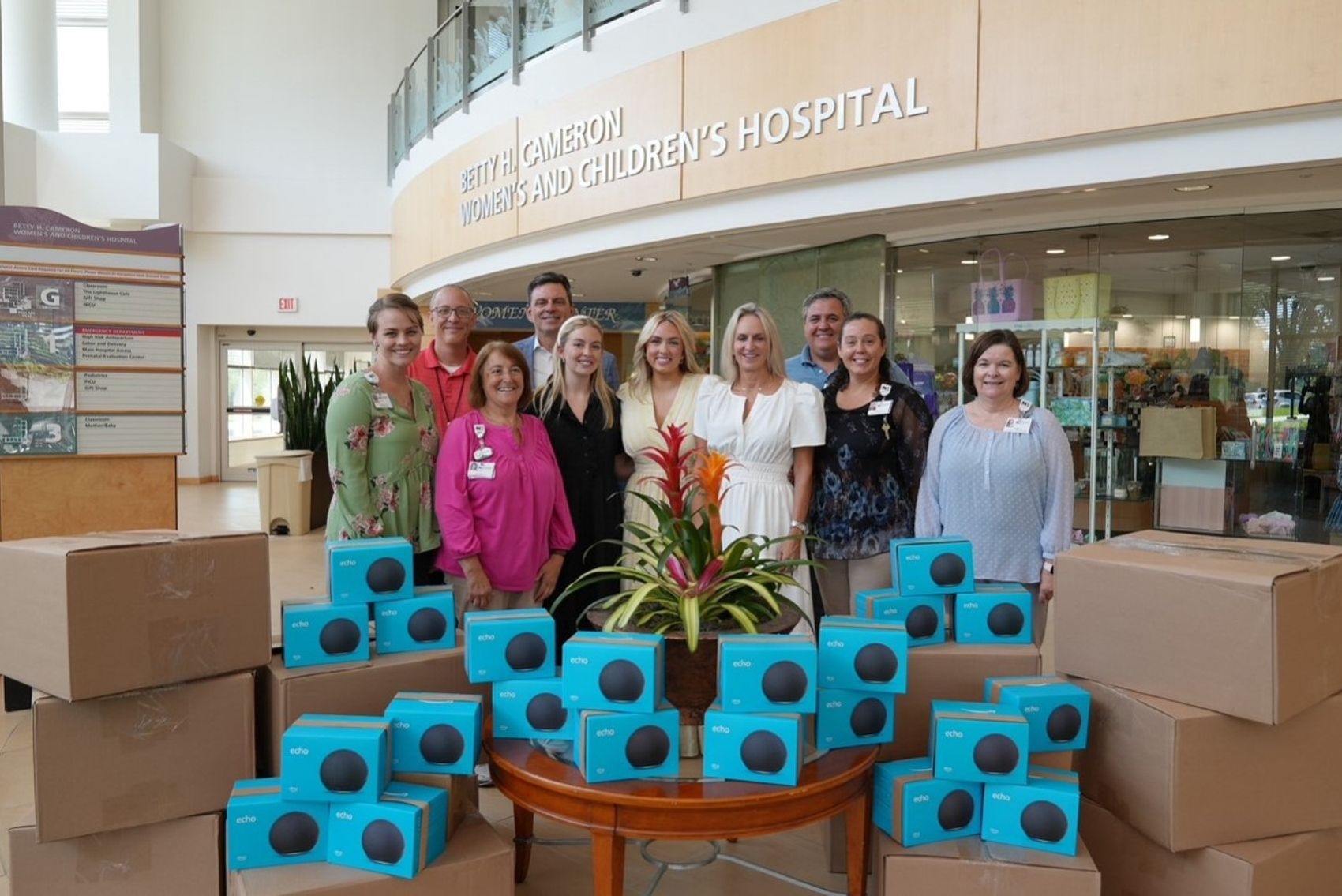 Megan Pearson pictured with family and hospital staff 