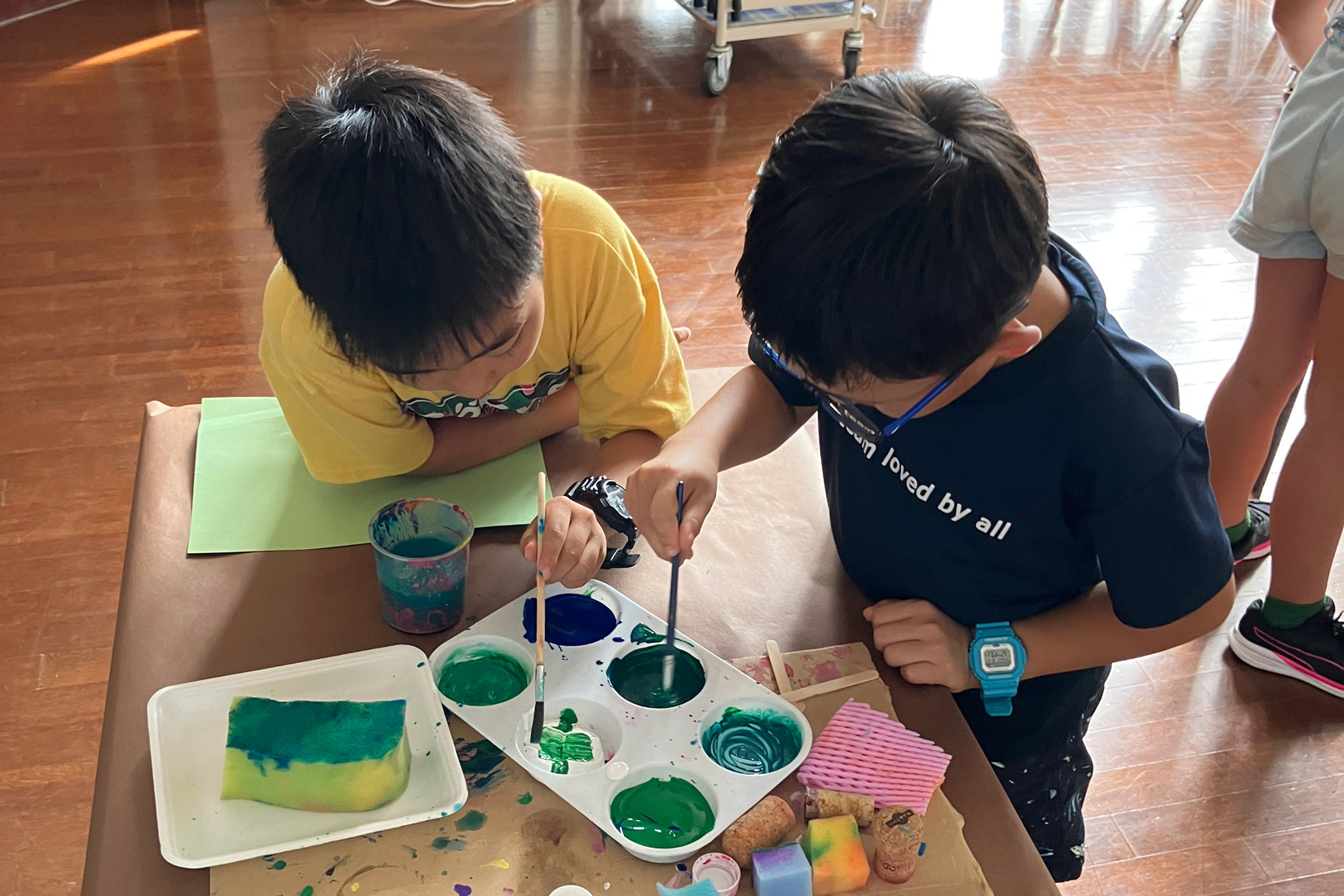students painting