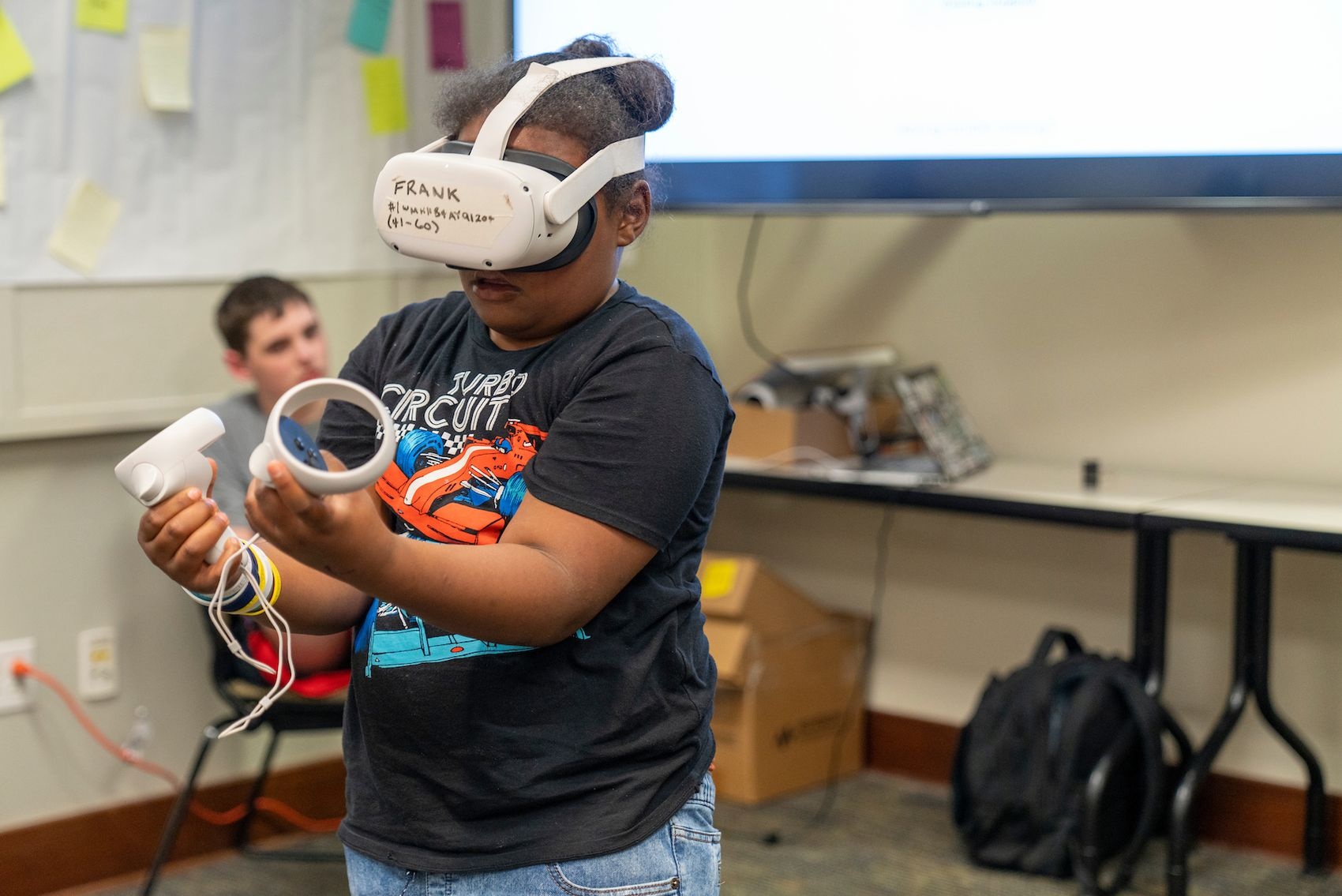 Child using VR headset at the NC Science Festival
