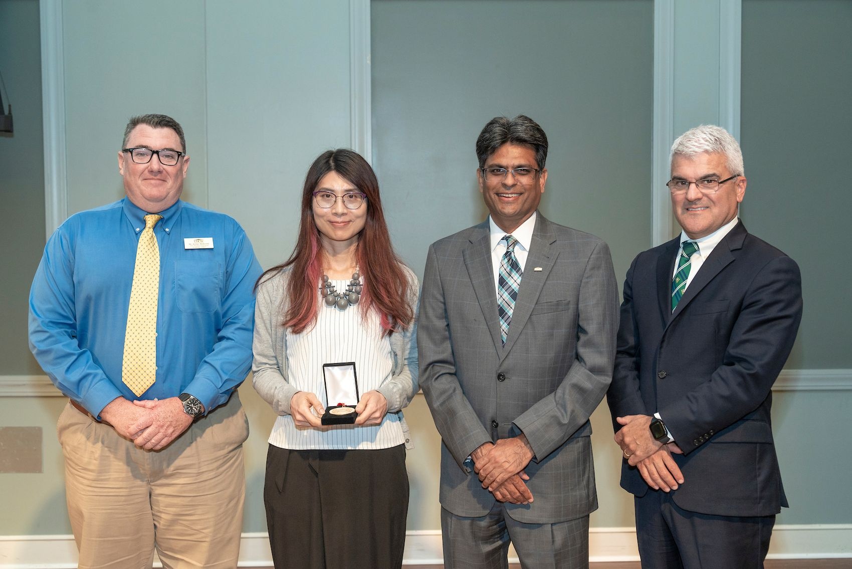 Hosted by Office of Faculty Affairs, UNCW honors faculty excellence during an awards reception at Burney Center May 2, 2024. Christine Liao, associate professor, Department of Early Childhood, Elementary, Middle, Literacy, and Special Education receives the Excellence in Online Education Award.