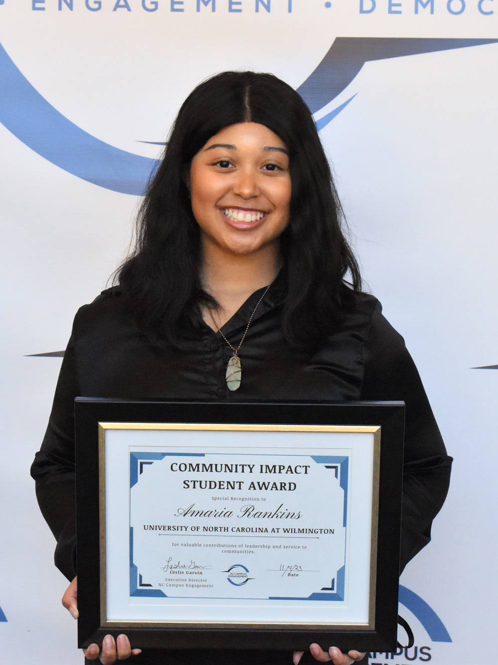 Amaria Rankins holding a CISA certificate