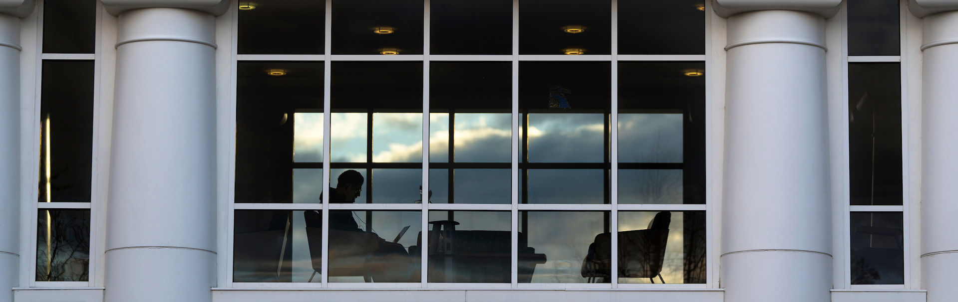 Student studying in walkway