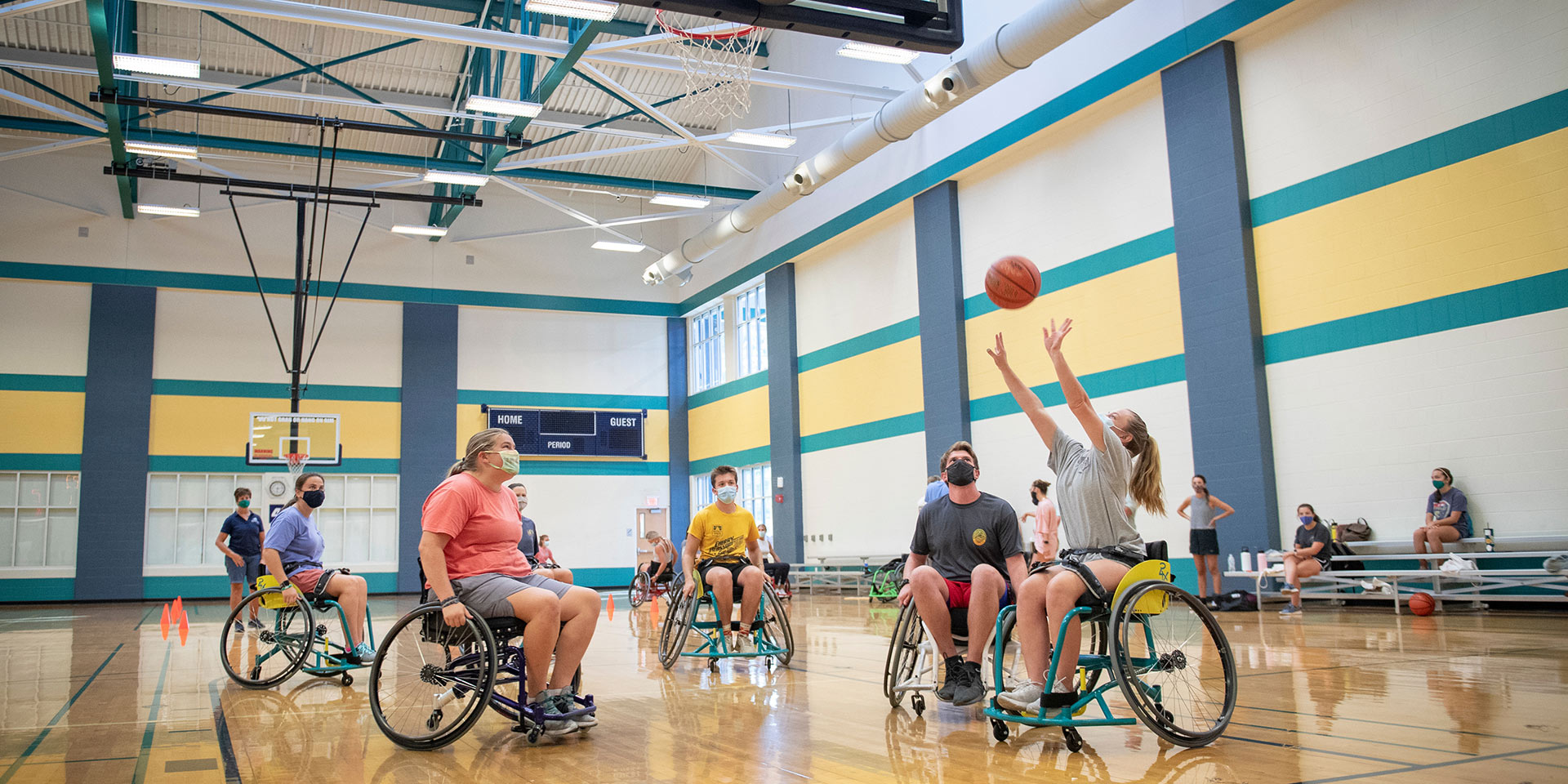 A game of wheelchair basketball being played