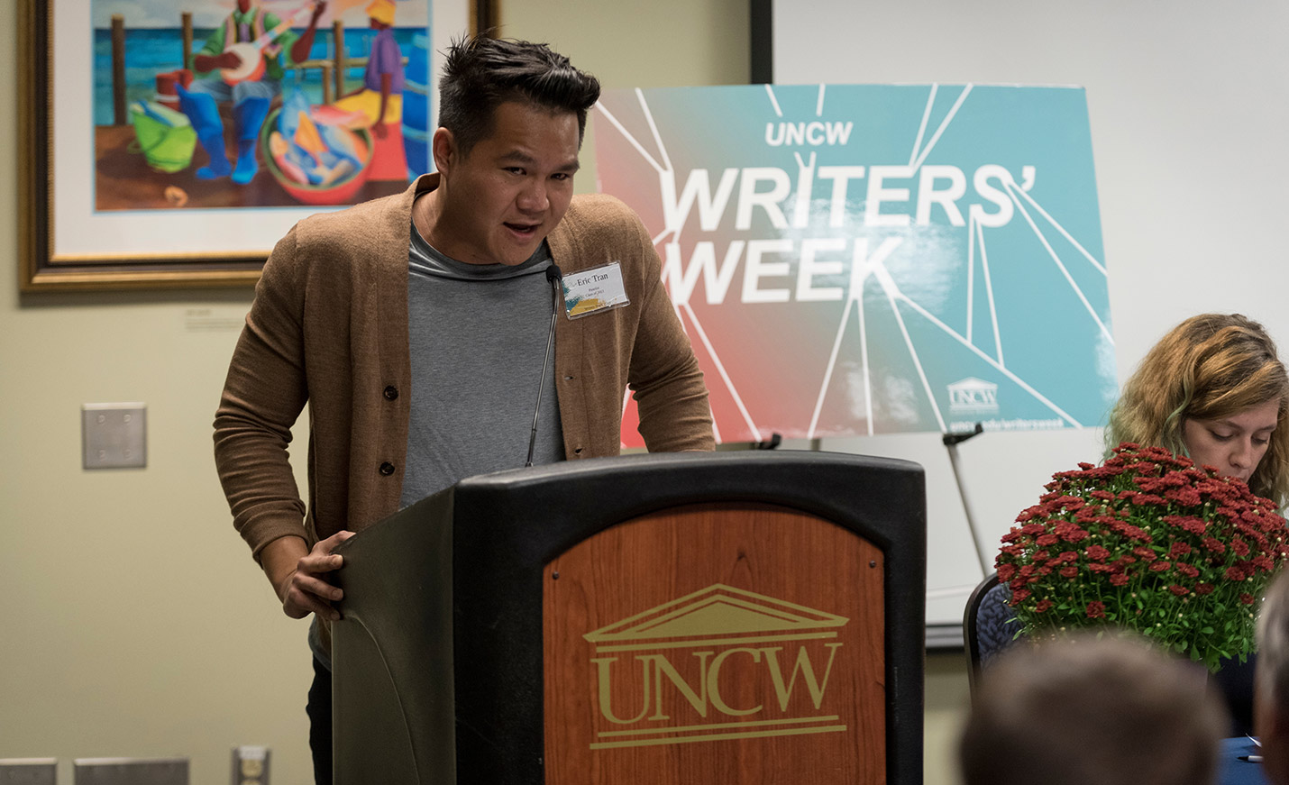 Writers' week speaker at podium