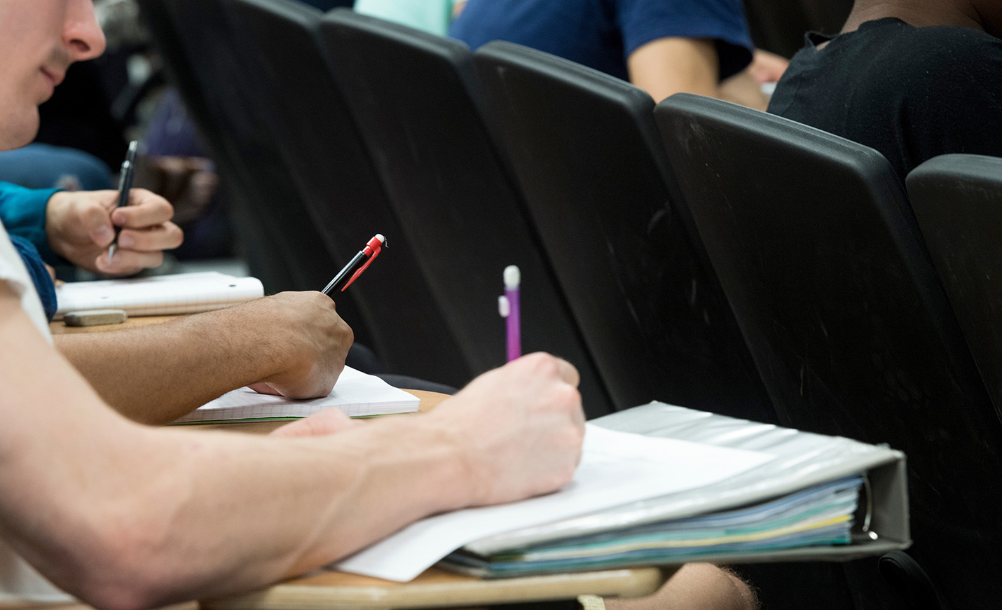 students taking notes in class