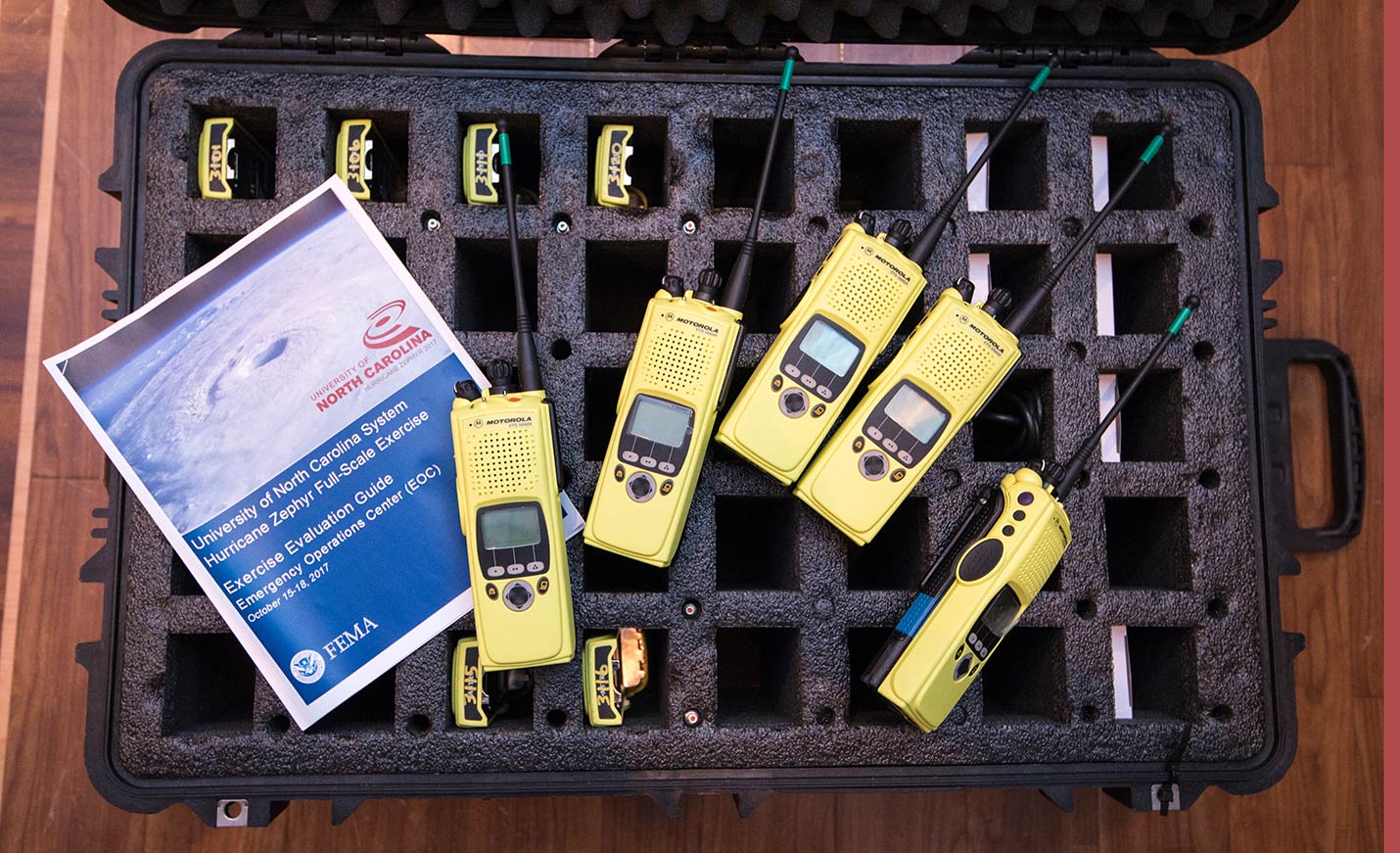 walkie talkies ready for distribution during a hurricane preparedness exercise
