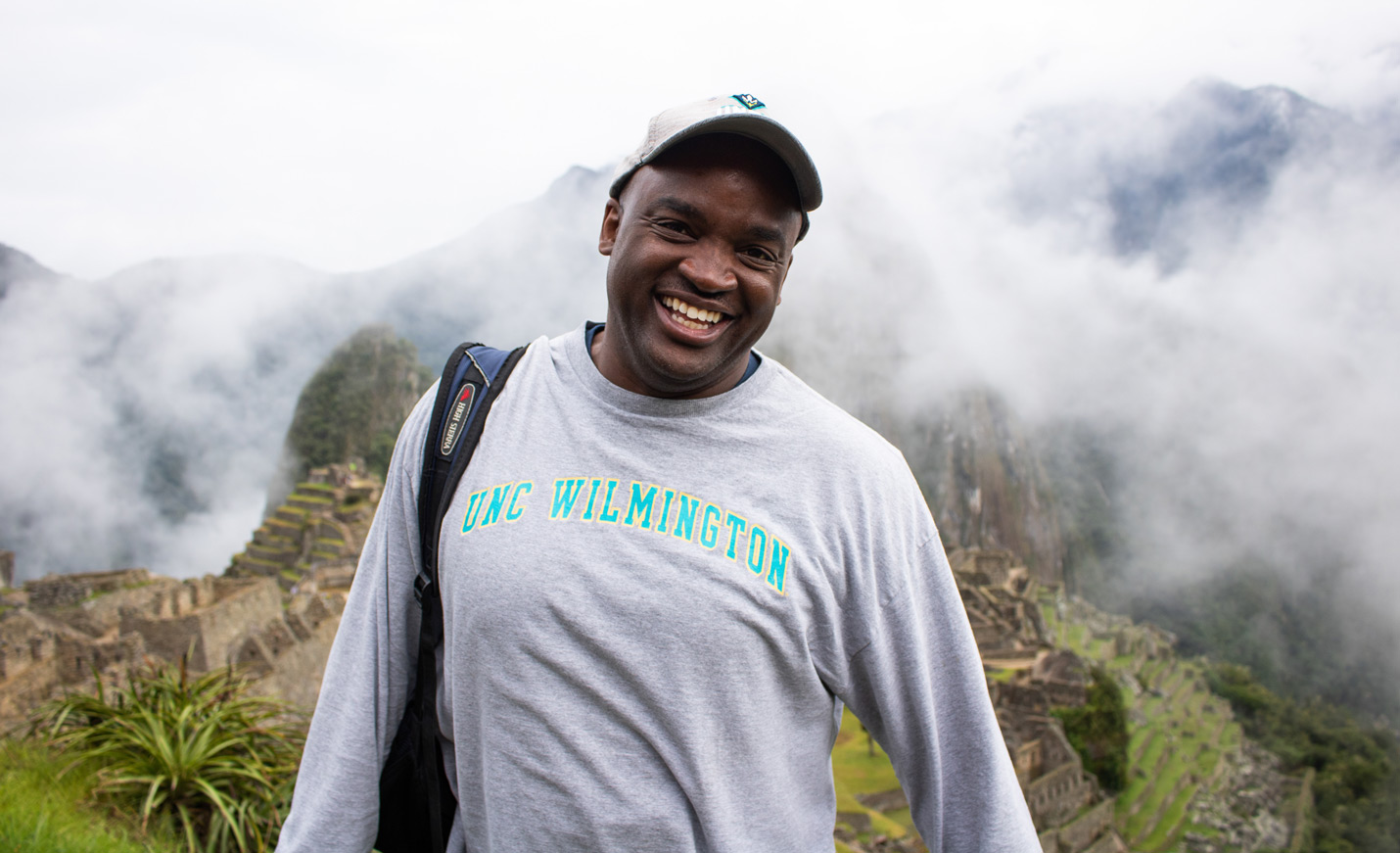 Professor Dr. Emmanuel Harris of World Languages and Literatures poses at Machu Picchu.