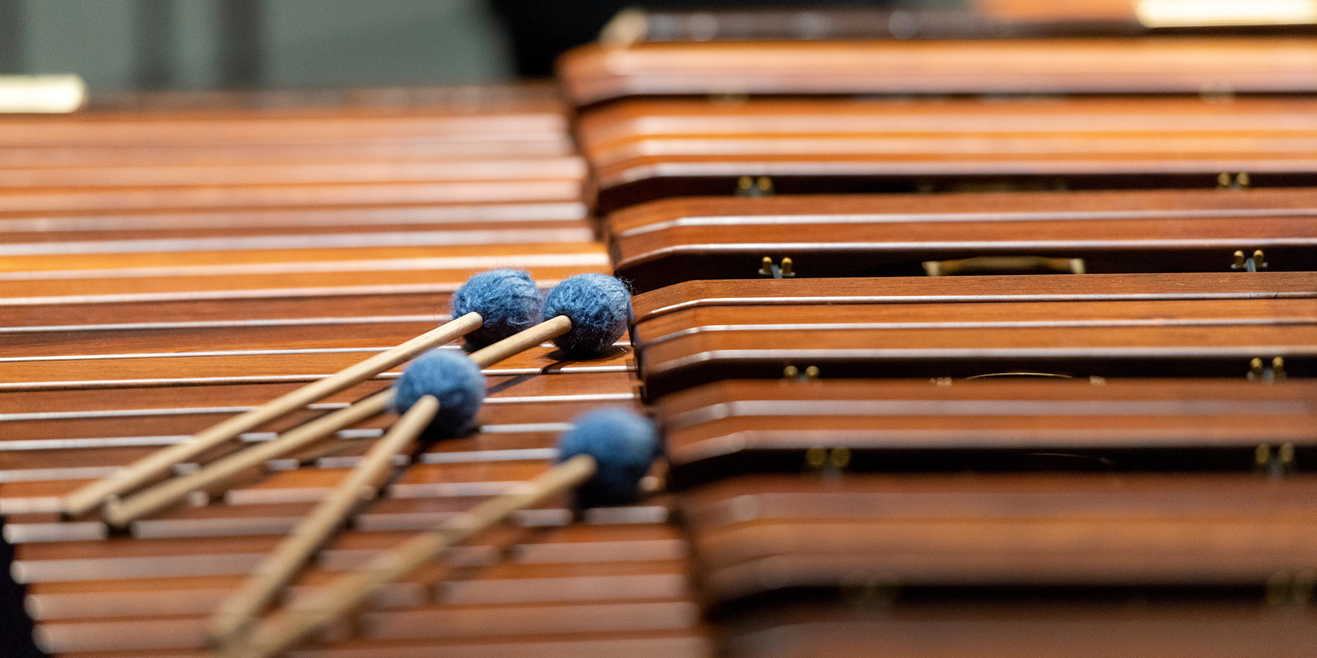 Xylophone mallets resting on a xylophone