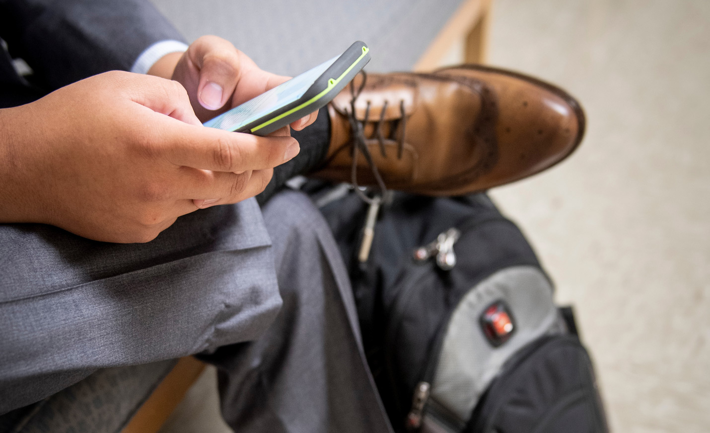 student using cellphone