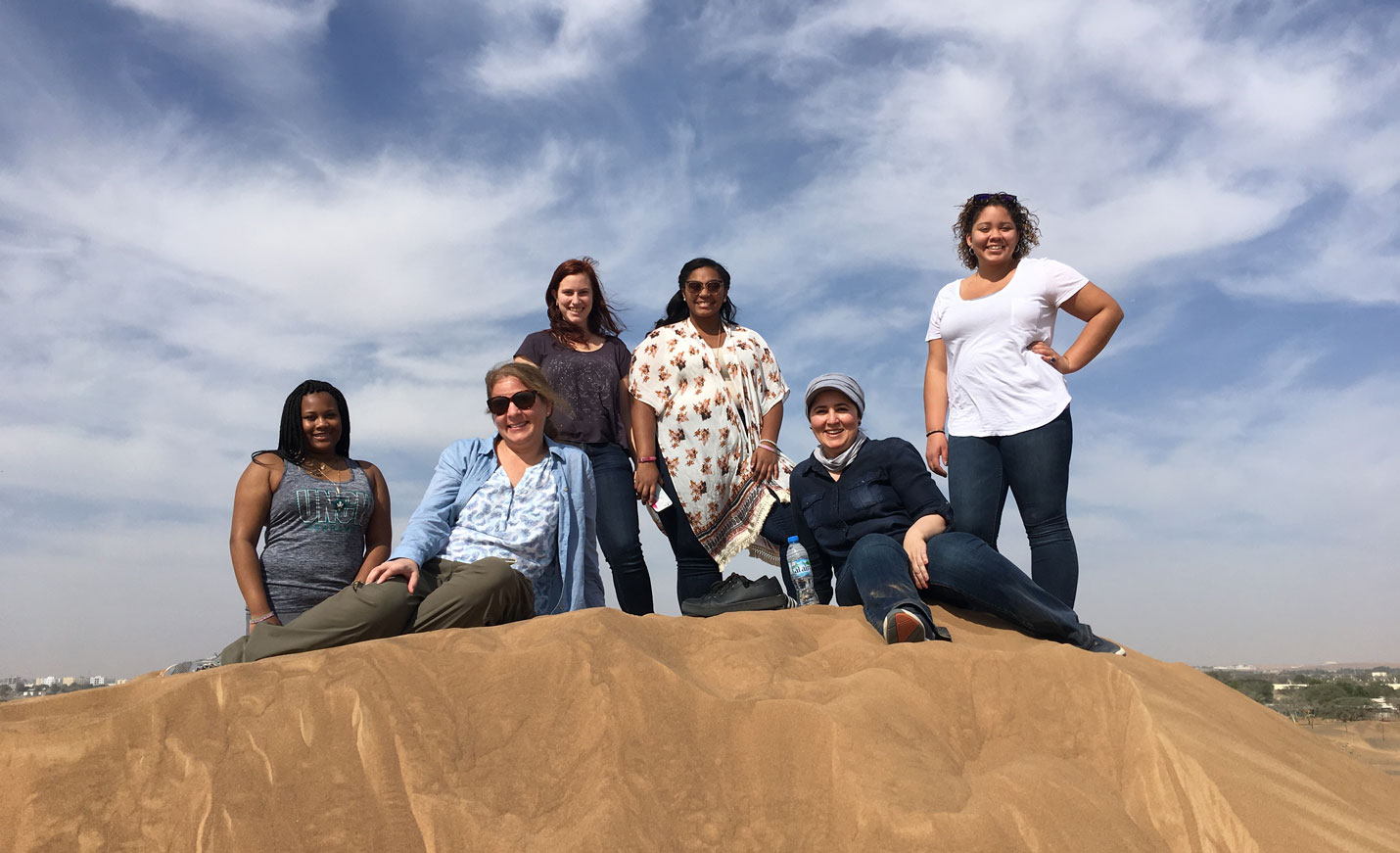 Students on a dune