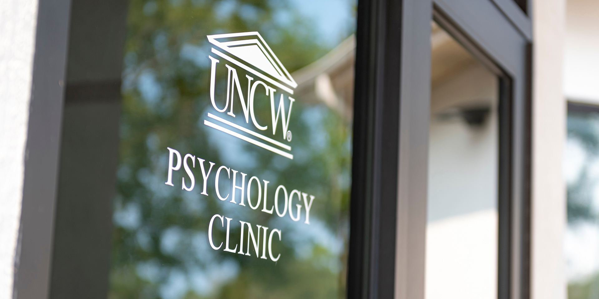 Writing on a door says UNCW Psychology Clinic