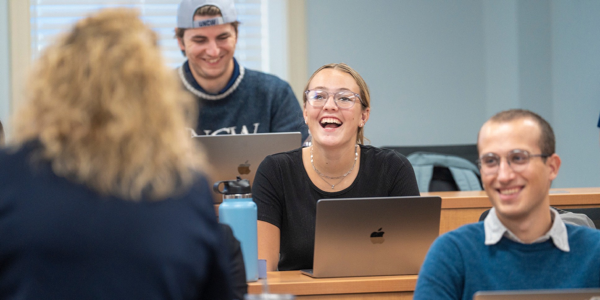 students smiling in class