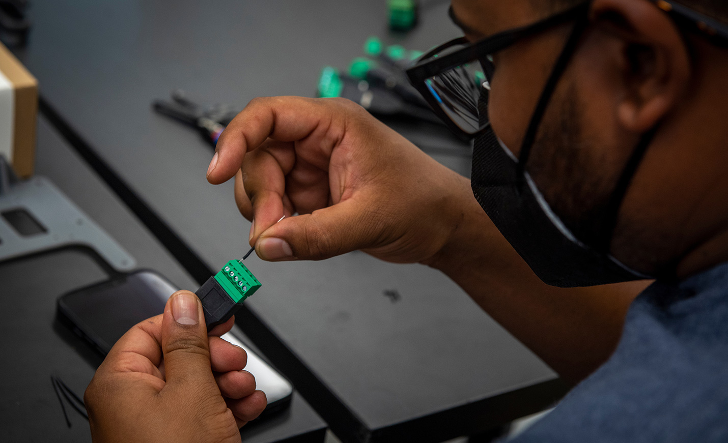 Student soldering 