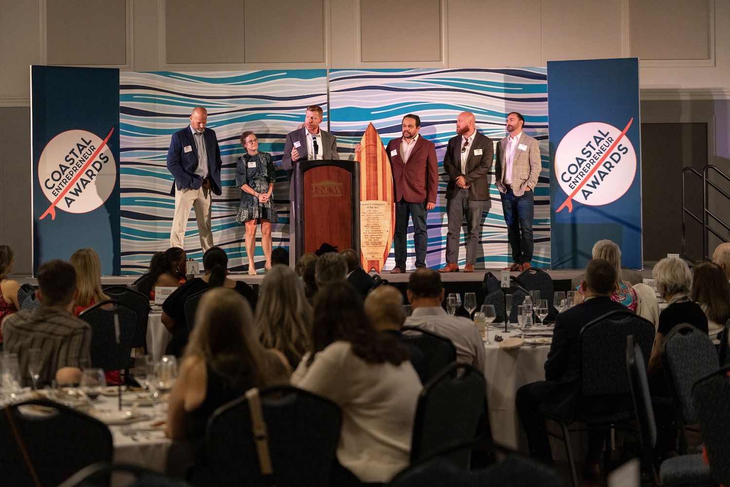 Honorees on stage at the 2025 Coastal Entrepreneurship Awards.