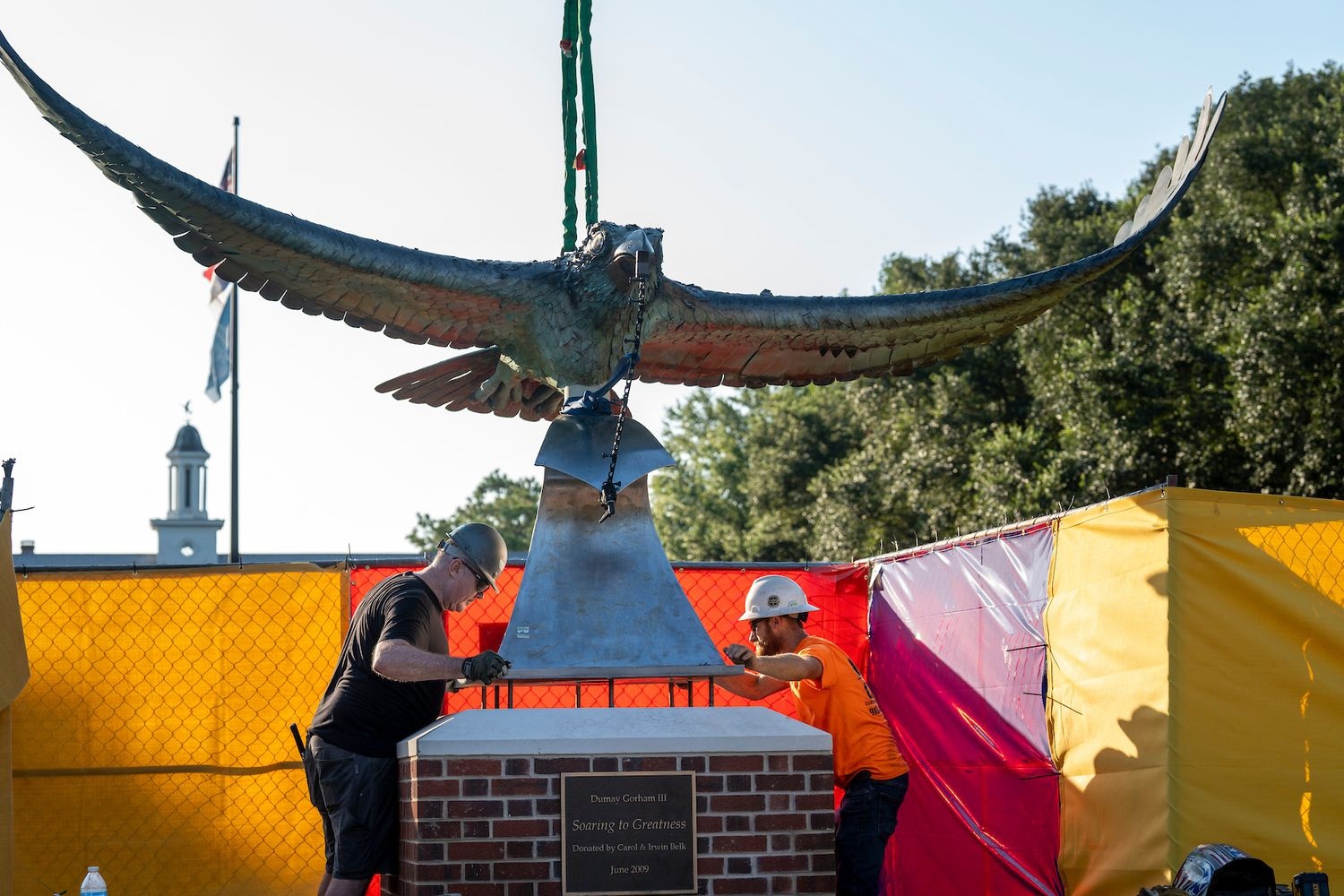 UNCW's iconic Soaring Seahawk Sculpture by local artist Dumay Gorham has taken flight to a new perch on Hoggard lawn