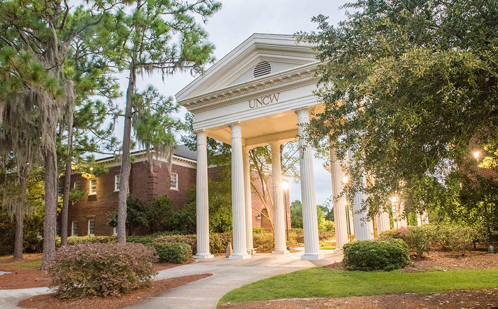 columned entrance on a corner of UNCW campus