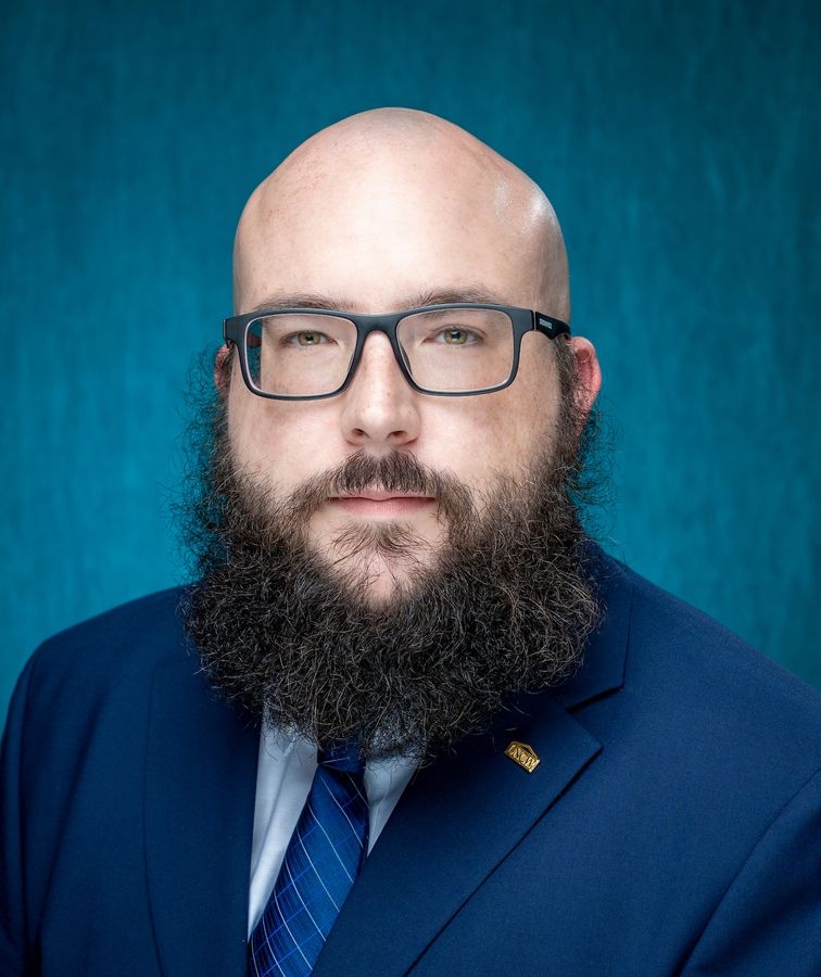 Nicholas J Koller