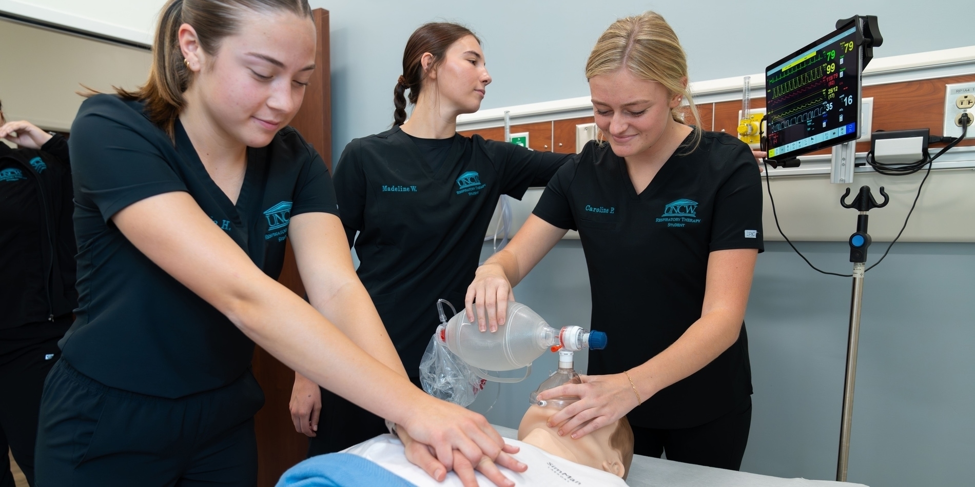 Respiratory therapy students practicing CPR