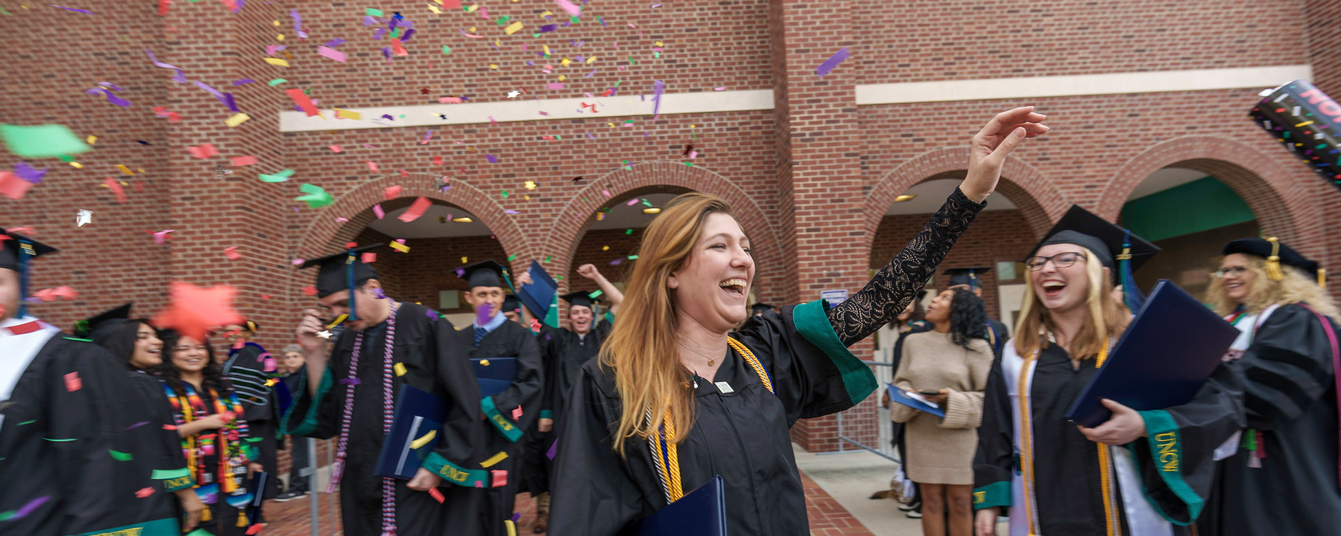 Students celebrate commencement with confetti