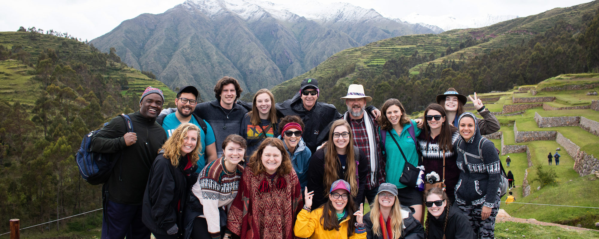 Student group photo at the famous lookout of Machu Picchu.