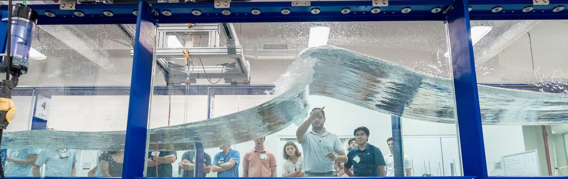 Assistant professor Ryan Mieras explains the Wave Flume Lab at UNCW's Coastal Engineering building