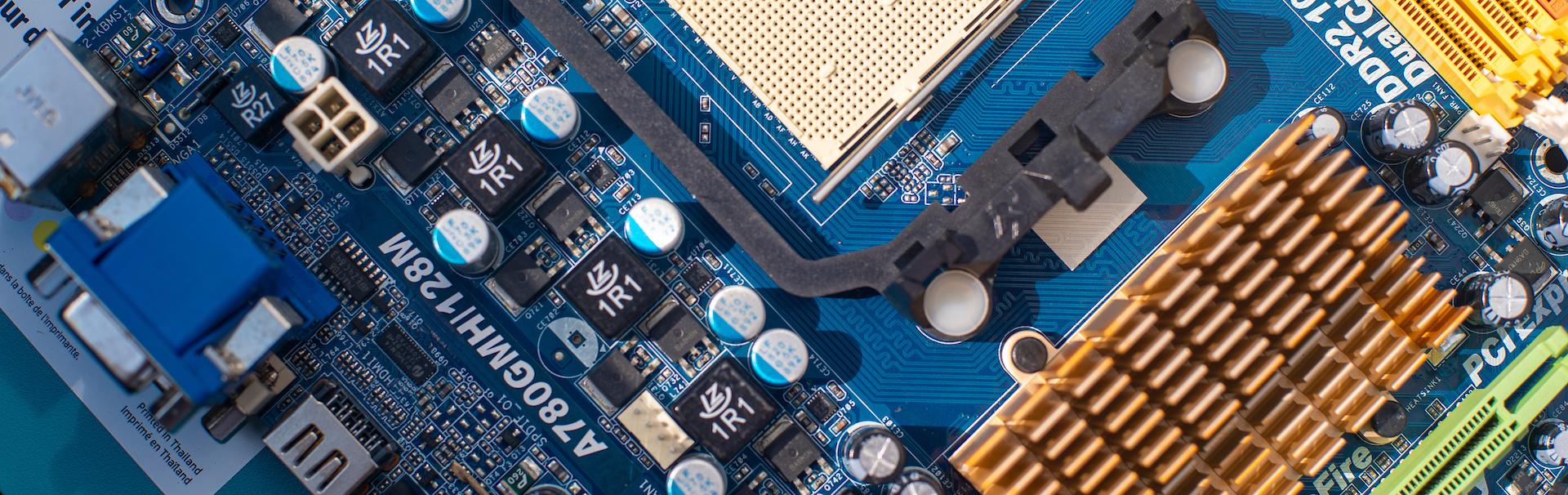 Zoomed in image of a motherboard from an electronic device.