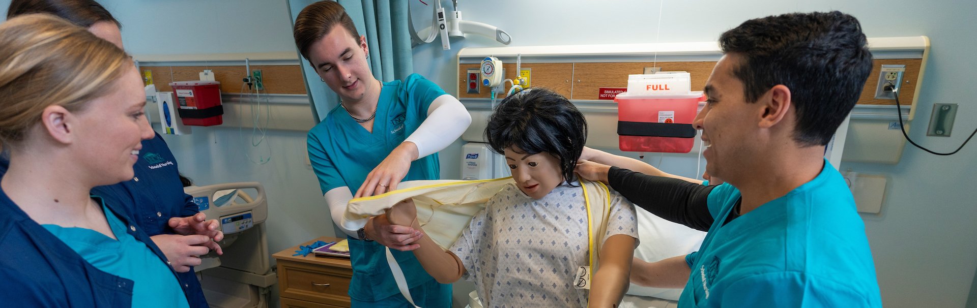 Students conduct experiment in a simulation lab