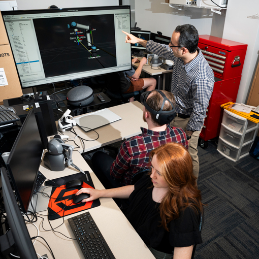 Students learning to create 3D models on computers