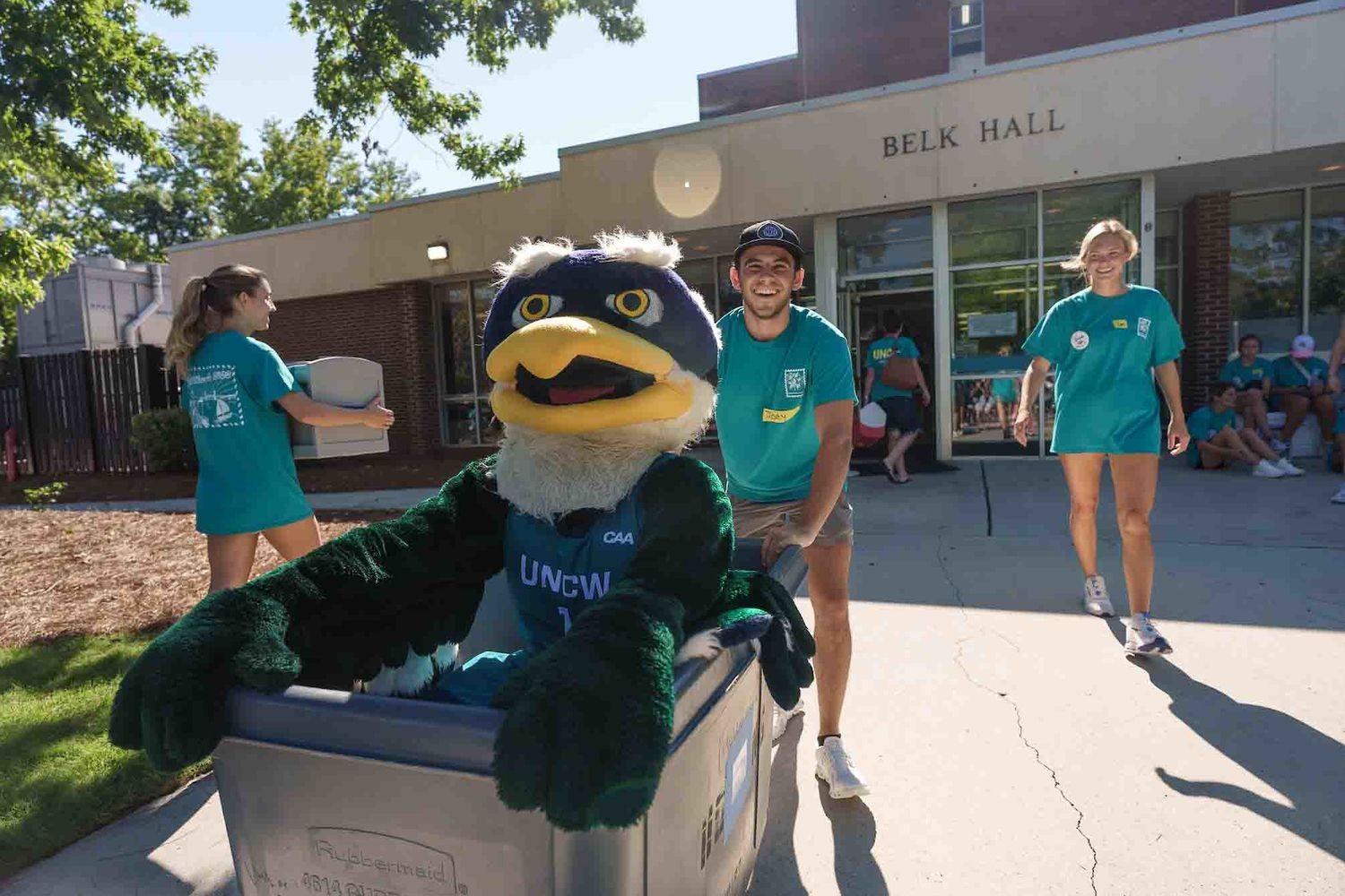 Sammy Seahawk mascot in a moving bin during move-in